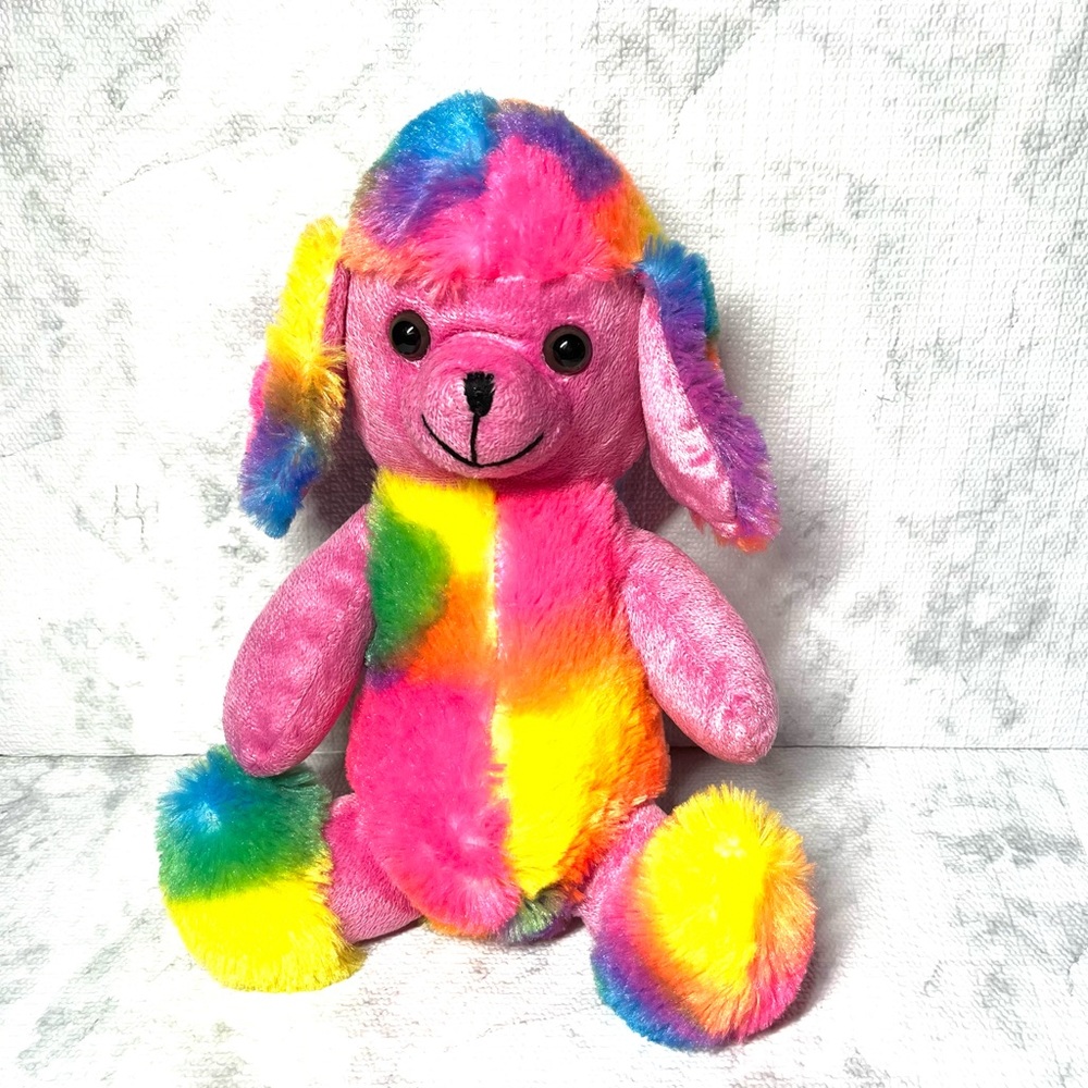 Kelly Toy 2017 Rainbow Poodle Plush Stuffed Animal. Approx 10" tall.